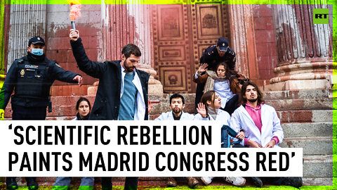 'Scientific Rebellion' members paint Spanish Congress building steps red