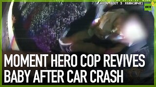 Moment hero cop revives baby after car crash