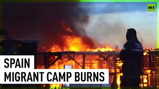 Migrant camp catches fire on demolition day