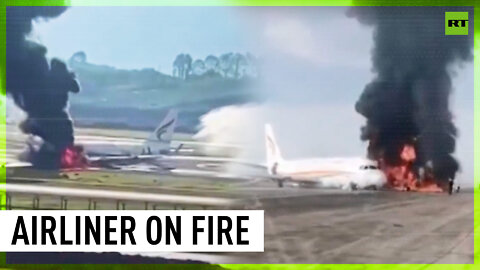 Chinese plane bursts into flames during takeoff