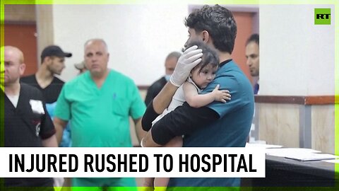 Injured from strike on Nuseirat refugee camp arrive in Gaza hospital