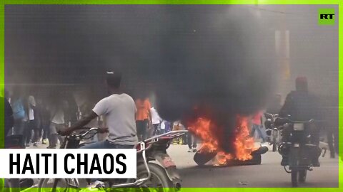 Hurling rocks & burning tires: Protests erupt over rising costs & insecurity in Haiti