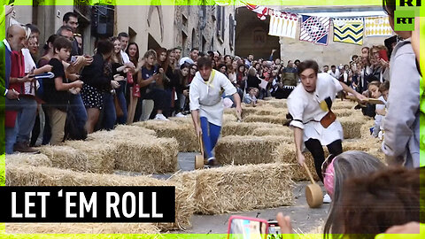 Italian town hosts annual cheese-rolling race