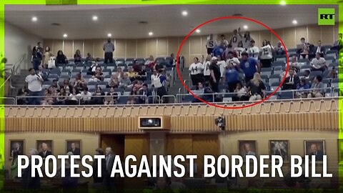Protesters interrupt chamber meeting rallying against Arizona-Mexico border bill