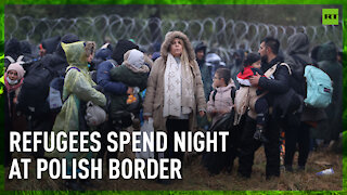 Thousands of migrants spend night at makeshift camp at Belarus-Poland border