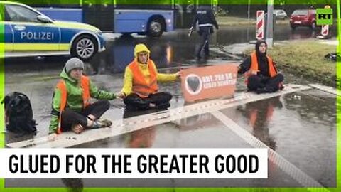 Activists glue themselves to roads in Germany, demanding climate action