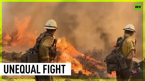 Firefighters battle raging inferno in California