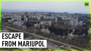 People on their way out of shattered Mariupol