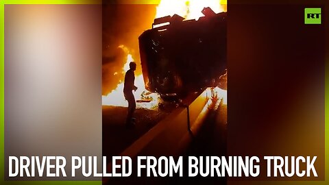 Driver pulled from burning truck