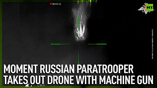Moment Russian paratrooper takes out drone with machine gun