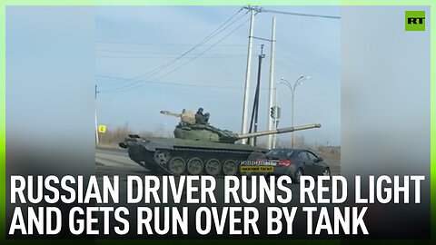 Russian driver runs red light and gets run over by tank