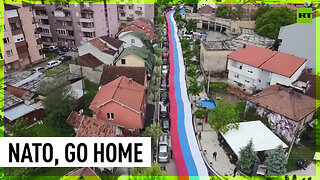 Giant Serbian tricolor unfurled in protest against NATO troops in Kosovo