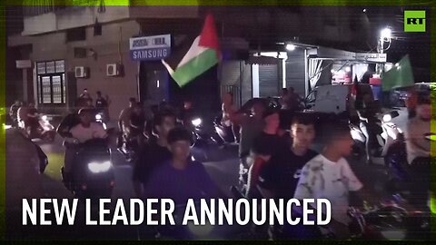 Hundreds celebrate the announcement of a new Hamas leader in Lebanon