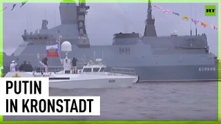 Putin inspects parade line of warships on Russia’s Navy Day