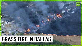 Grass fire erupts in Dallas suburbia