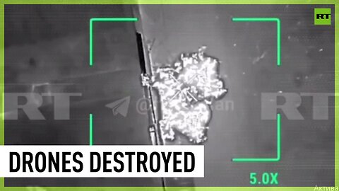Russian bomber drone destroys van filled with Ukrainian UAVs | RT Exclusive