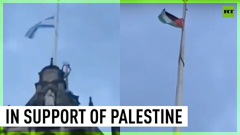 Protester replaces Israeli flag with Palestinian on UK town hall