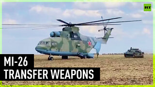 Russian Mi-26 helicopters transfer weapons, military equipment, and personnel