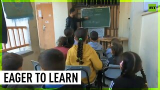 Displaced Palestinian children study in makeshift classroom in Rafah