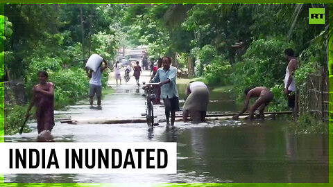 Floods submerge houses and streets in Indian state of Assam
