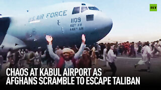 Chaos at Kabul airport as Afghans scramble to flee Taliban