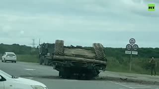 Tankside-Down | Tank lands upside-down on eastern Russian road