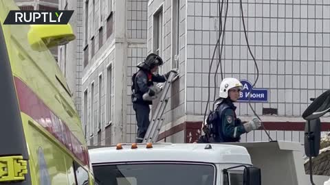 EMERCOM workers rescue a cat from gas-blast-rattled residential building in Noginsk, Russia