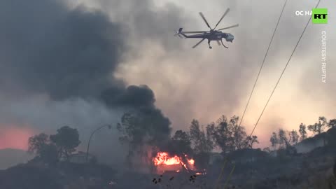 Deadly wildfire spreads through thousands of acres in California