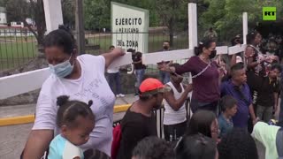 Migrants hold protest at Mexico military base