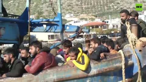 Greek coastguard rescue fishing boat with 500 migrants onboard off Crete’s coast