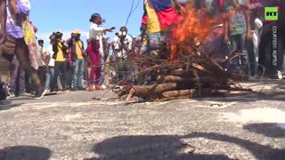 Haitians wave Russian flags at anti-govt rally