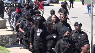 Armed activists march in Tulsa, Oklahoma on 100th anniversary of black massacre