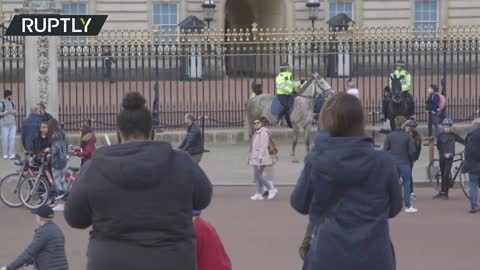People gather outside Buckingham Palace after Duke of Edinburgh passes away