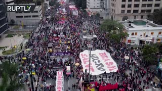 Thousands of Brazilians protest Bolsonaro's COVID response as country's death toll surpasses 500,000