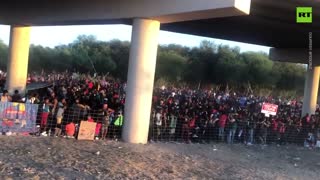 Shocking footage shows 10,000+ migrants packed under Texas bridge