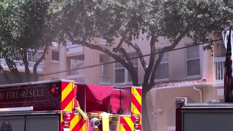 Massive fire engulfs residential building in Miami