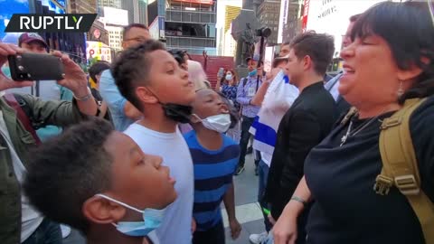 Pro-Israel and pro-Palestine protesters brawl in NYC Times Square following ceasefire announcement