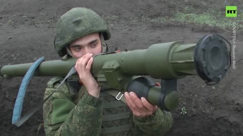 Russian snipers and rifle brigades hone their skills in military drills