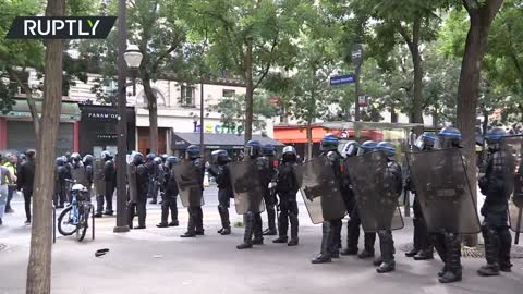 Tear gas deployed during Bastille Day demonstration in Paris