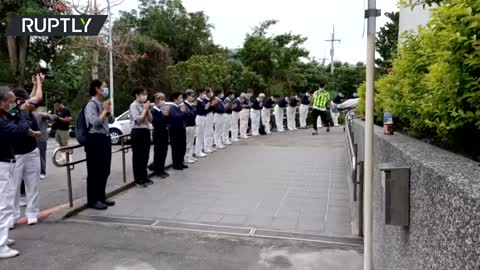 Locals pay tribute to Taiwan train derailment victims