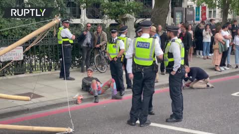 XR scuffle with police as activists block road near London’s Science Museum