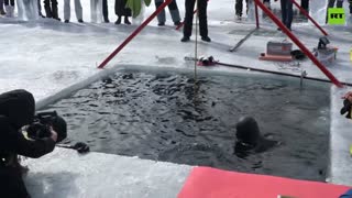 Russian freediver sets new world record, plunging 80 meters under Baikal ice