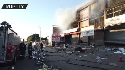 Looting and riots prompt police deployment in Johannesburg following jailing of ex-president Zuma