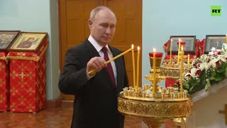 Putin visits Orthodox Church in Harbin, China
