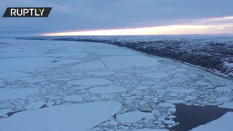 The Yenisey River sheds its icy coat