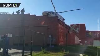 Medical helicopter makes hard landing on a roof in Russia's Izhevsk