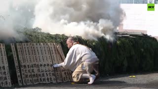 A toasty ritual | Buddhist monks walk through embers in Japan