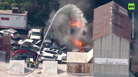 Inferno engulfs Philadelphia junkyard