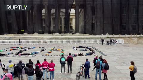 Die-in protest | Colombian activists demand justice for 6,402 victims of extrajudicial killings