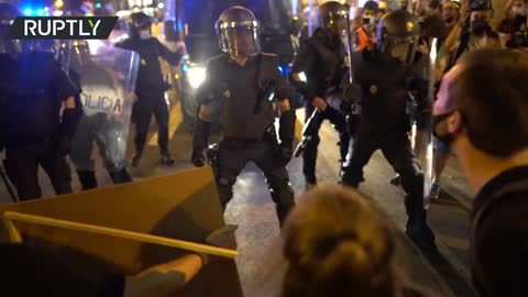 Anti-homophobia demonstrators scuffle with police at protest over killing of gay man in Madrid